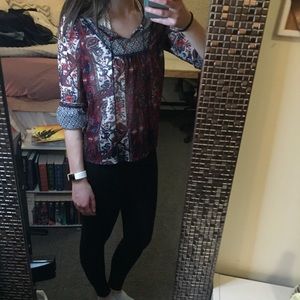 Sheer top with 3/4 sleeves.